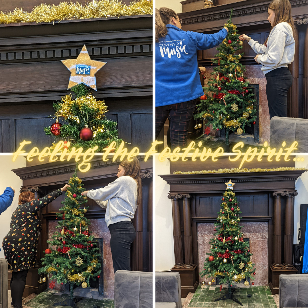 Coventry Music staff decorating the Christmas tree