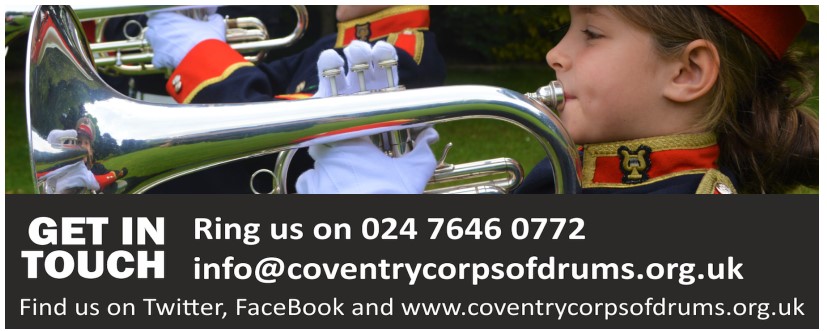 image of a child in uniform playing a horn as part of a marching band