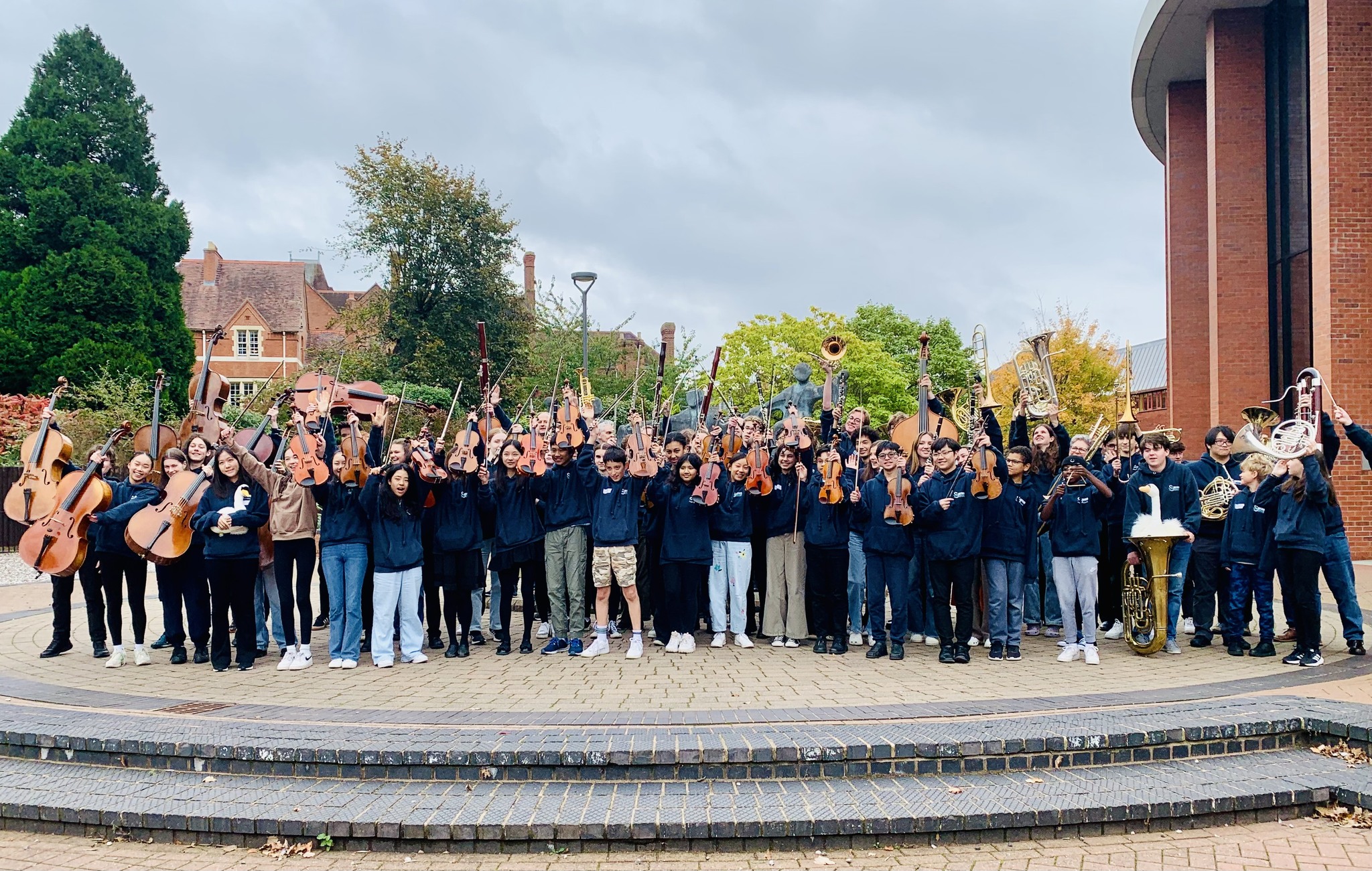 young people waving