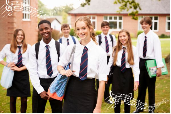 Secondary school students in uniform walking from school